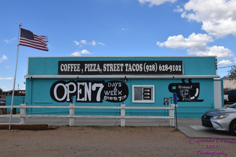 The aqua and teal Hwy 68 IL Cafe building in Golden Valley